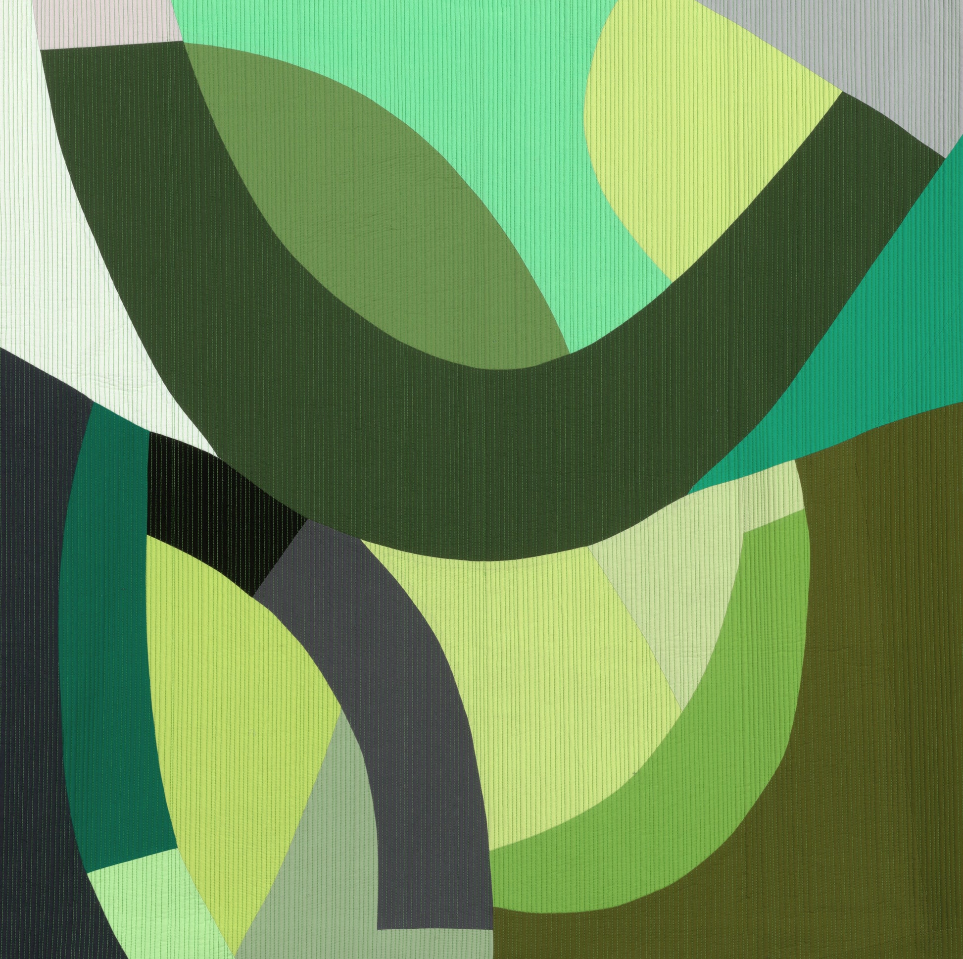 Art quilt with abstract design with green curves
