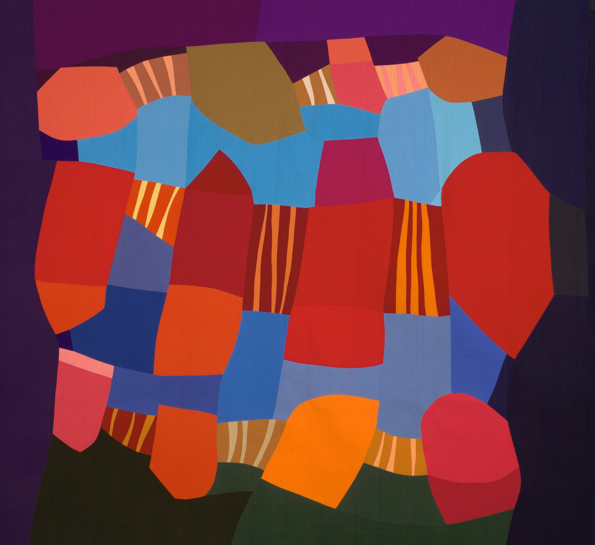 Abstract art quilt with colorful geometric shapes on a dark background