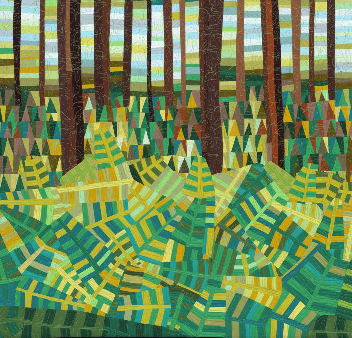 Art quilt showing abstracted forest