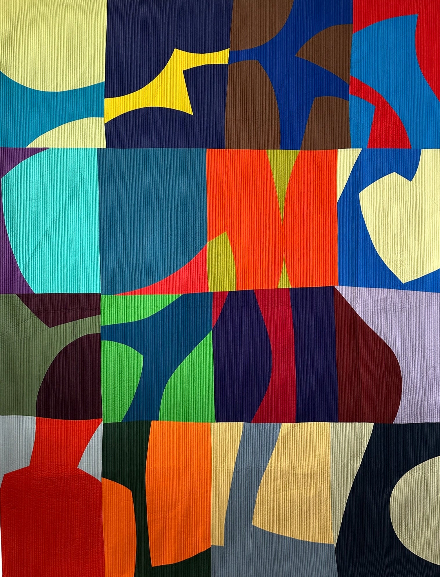 Colorful abstract quilt with geometric patterns