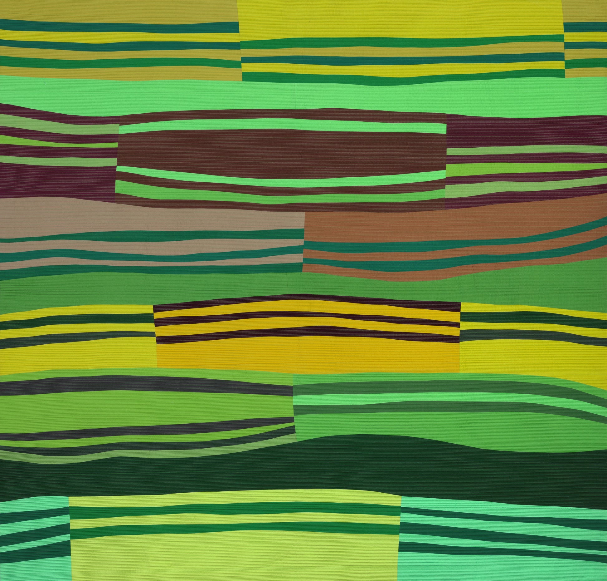 Colorful abstract art quilt with green, brown, and yellow colors.