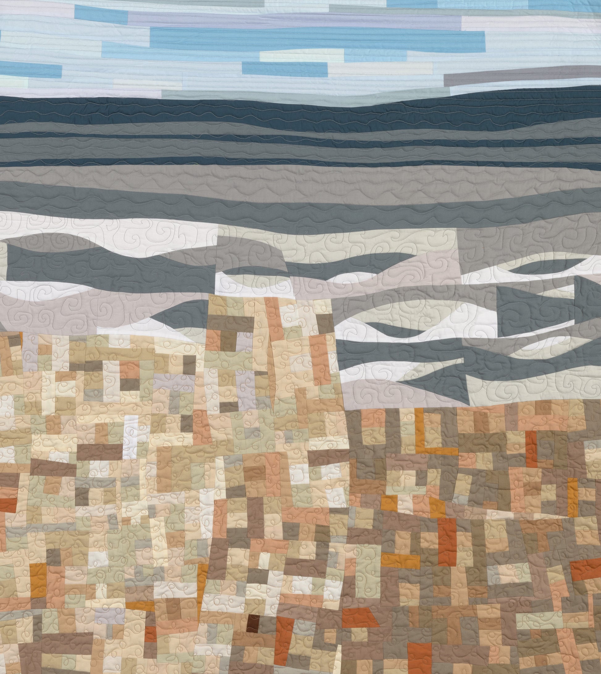 Art quilt with abstracted beach scene