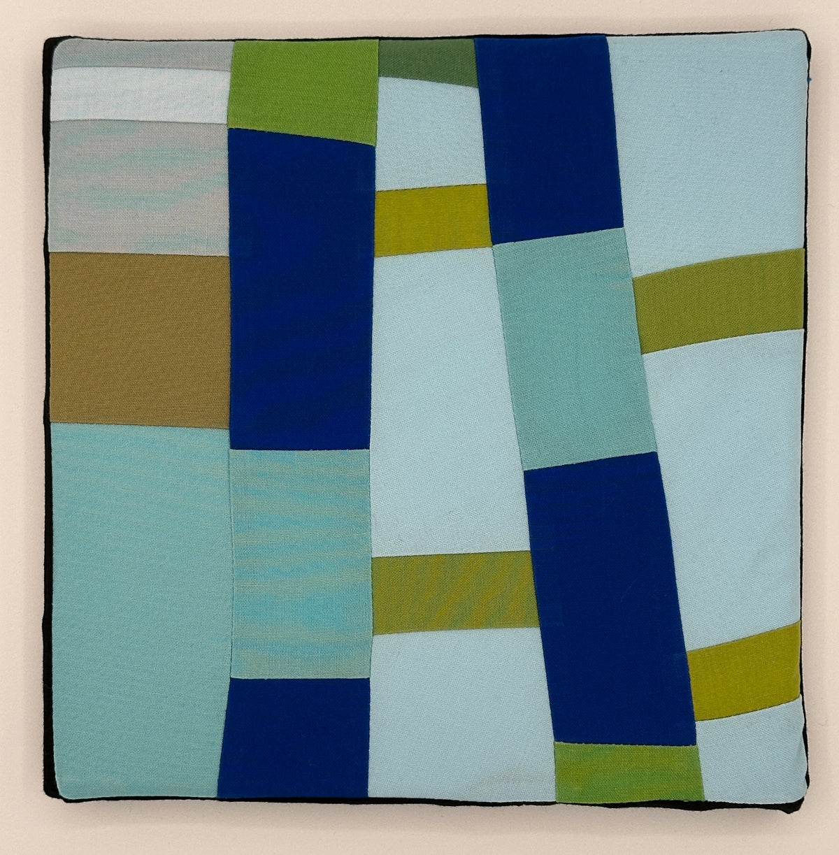 Light and medium blue and flat green