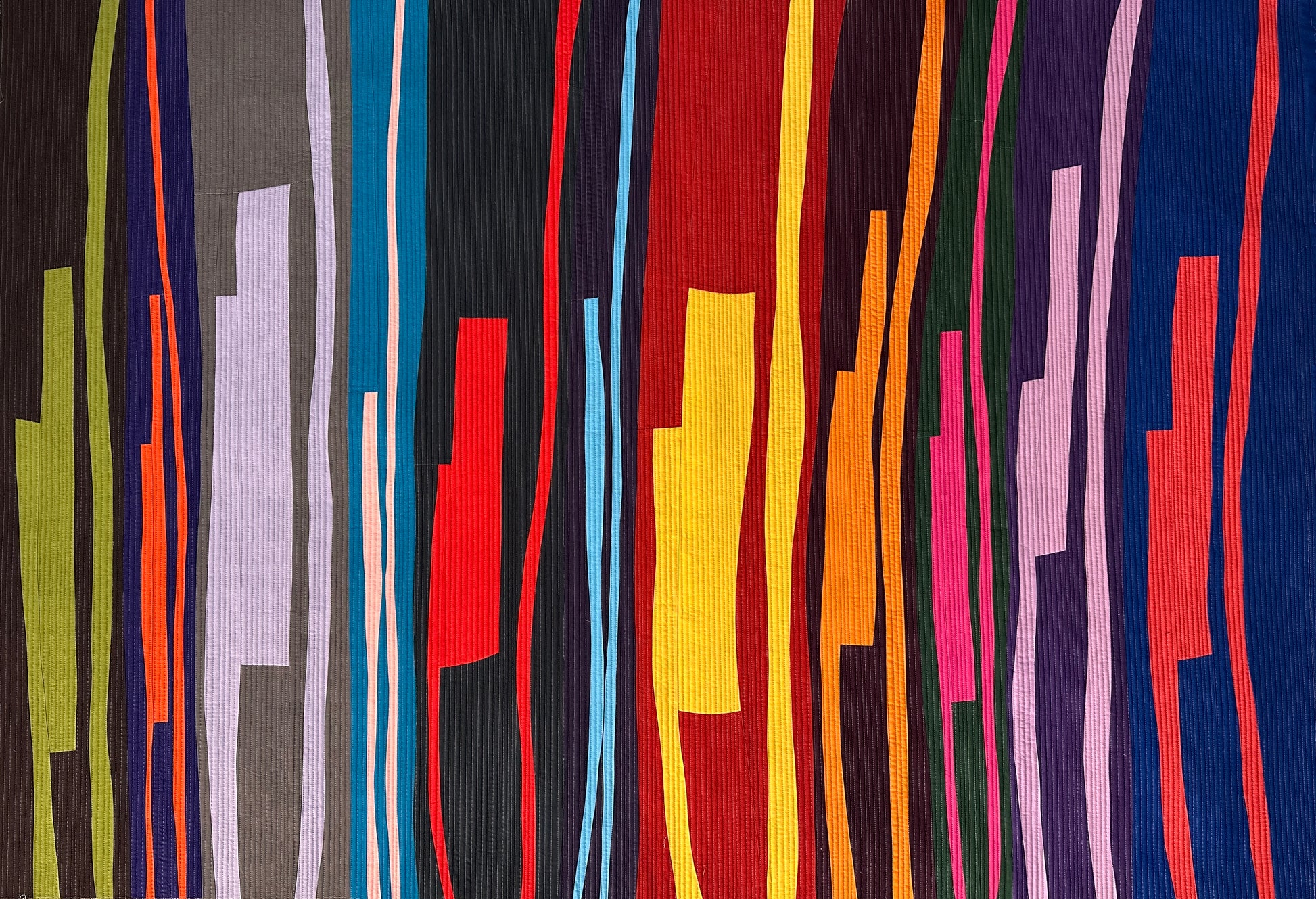 Colorful abstract art quilt with vertical stripes