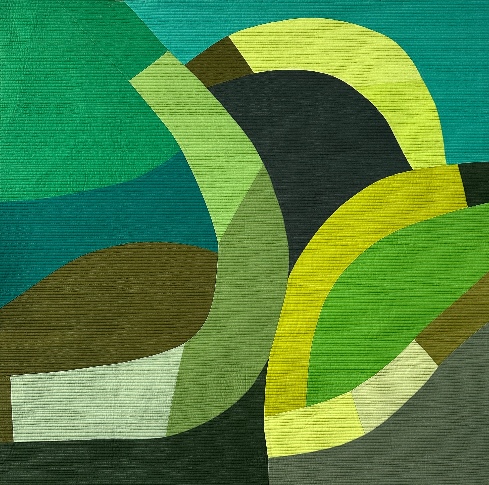 Abstract art quilt with green, yellow, and brown curved shapes